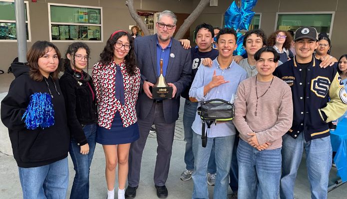 IPoly High School students and staff hold Golden Bell Award